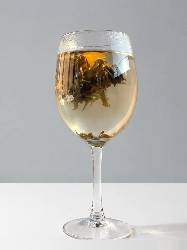 The tea ball starting to open