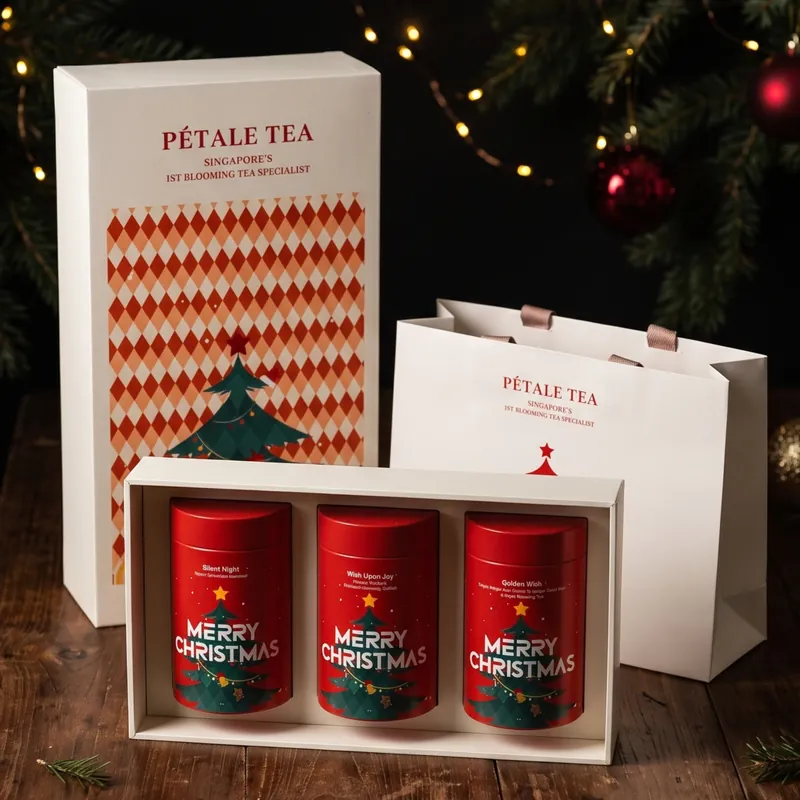 Three Wishes Christmas gift box with three red tins